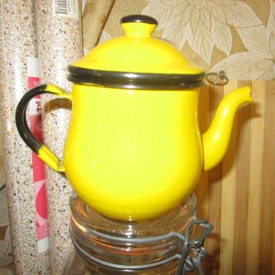Kitchenware collection with a cute yellow tea pot
