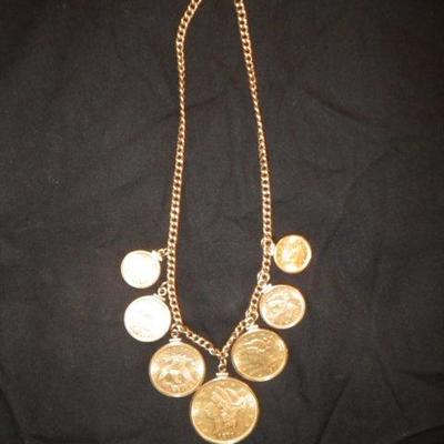 Gold coin necklace, $20 coin, two $10 coins, two $5 coins, two $2 1/2 coins on a 14kt chain