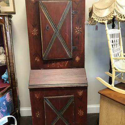 Antique fun conversation piece. This has a cabinet door at top with shelves and in the middle is a secretary's compartment and another...