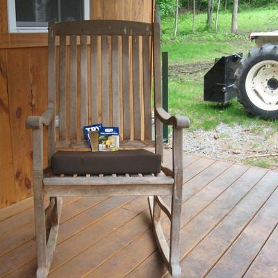 Pair pf Teak wood rocking chairs