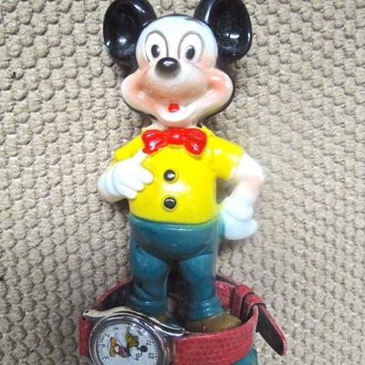 Vintage Mickey Mouse watch toy with later model Mickey Mouse watch.