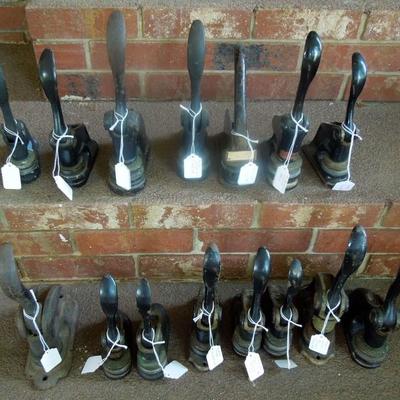 Collection of antique corporate, legal and fraternal hand press cast iron seal embossers.