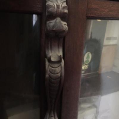 $600  Antique Quarter Sawn Oak Vitrine/Cabinet with Glass Front & Beast Accent (contents not included)  (photo 2 of 2)    * Cash...
