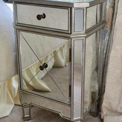 One of a pair of mirrored nightstands