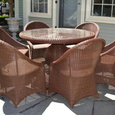 Wicker patio table and 6 chairs