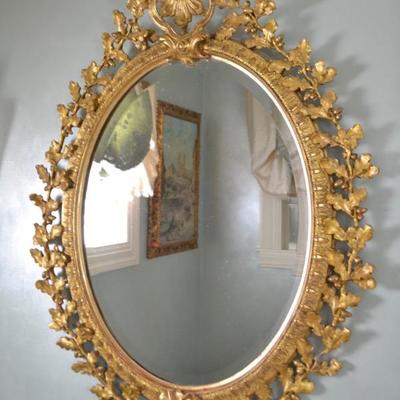 Antique gilt mirror decorated with oak leaves and acorn clusters