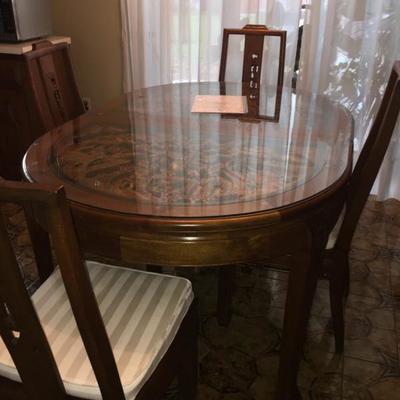 Unique dining room table with beautiful engravings