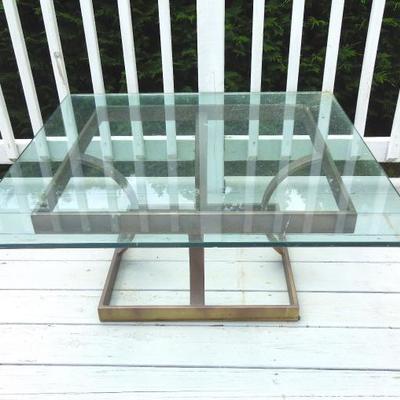 Square glass and metal base coffee table
