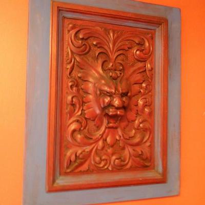 Wood carved relief of animal spirit wall art