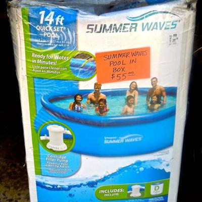 Unopened Summer Wave swimming pool with pump.