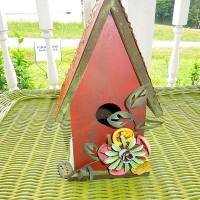 Metal adorned birdhouse