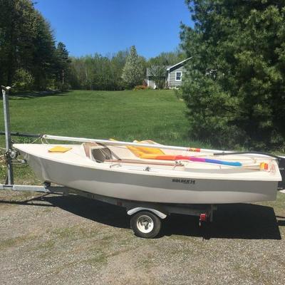 14 foot sailboat with trailer by Hobie Cat. Fully equipped.