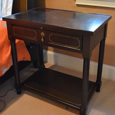 One of a pair of bedside tables