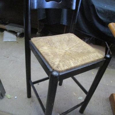 Set of two wooden with woven seat bar stools