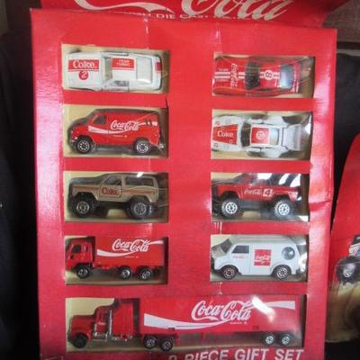 Vintage Coca Cola cars and trucks