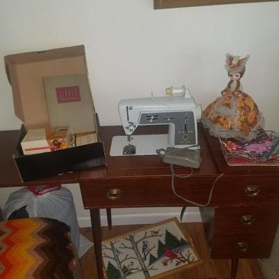 Sewing machine in cabinet 50% off