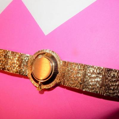 Gentleman's watch by Geneva, 14K YG  swiss movement, the band is 14KYG.  Buy it Now. $1,750.00