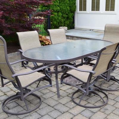 Patio table and 6 swivel chairs
