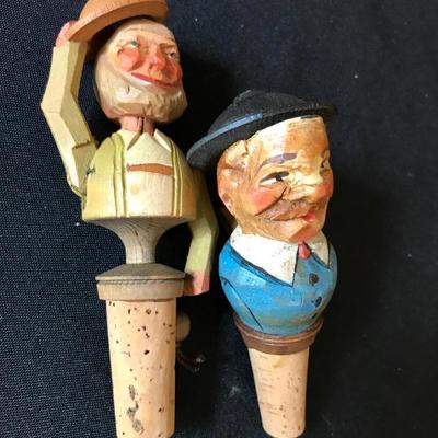 wooden puppet head wine corks