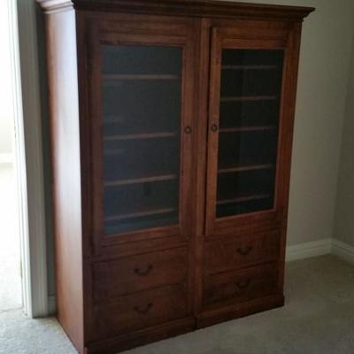 Ethan Allen Country Crossings entertainment end units can be used as a bookcase, cherrywood