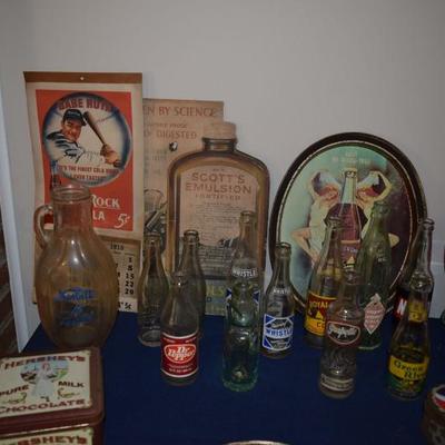 Vintage pop bottles, signs, jars