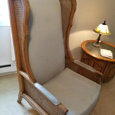 wing back chair with caning on sides 