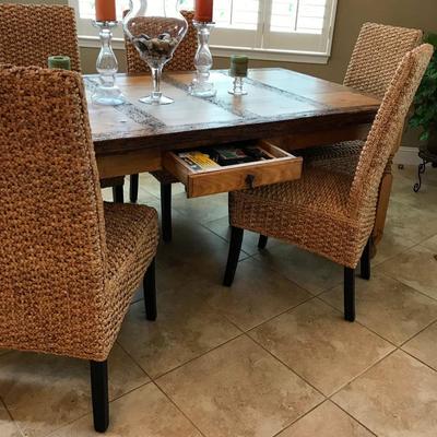 Wormhole Rustic Farm Dining Table with a unique drawer. Set of 6 Woven Seagrass Dining Chairs.
