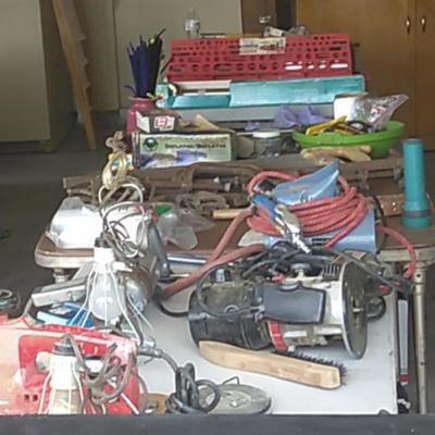 Tables filled with tools in garage