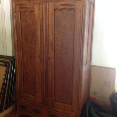 Antique armoire, stereo, books
