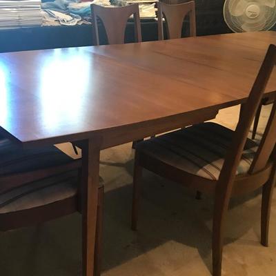 Dining Room table with three leaves, pads and 6 chairs