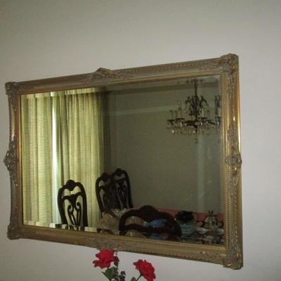 Gold framed beveled mirror