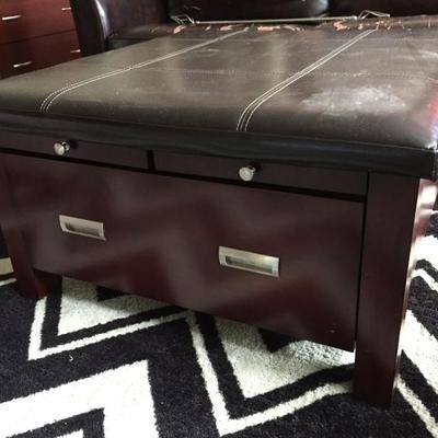 Pottery Barn ottoman with lots of storage.