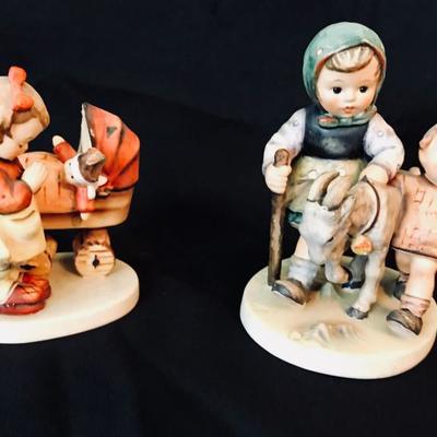 [left] Doll Mother Hummel Figurine 67 (TMK 5, 1970's): $100 ...... [right] Homeward Bound Hummel Figure 334 (TMK 5, 1970's): $80