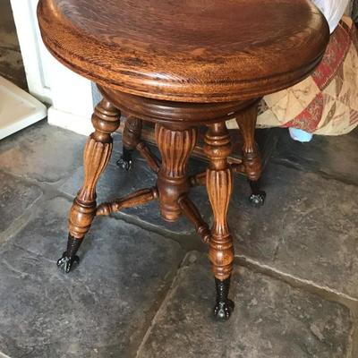 Antique piano wood stool with glass ball claw feet. $115