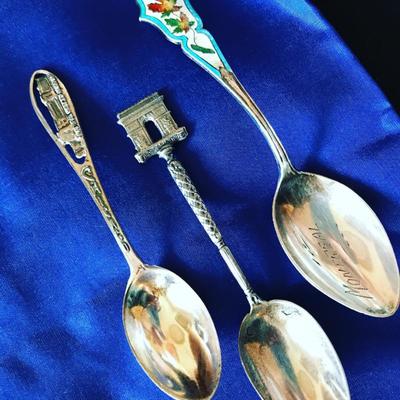 Over 25 sterling silver souvenir spoons from Europe, Canada and U.S.