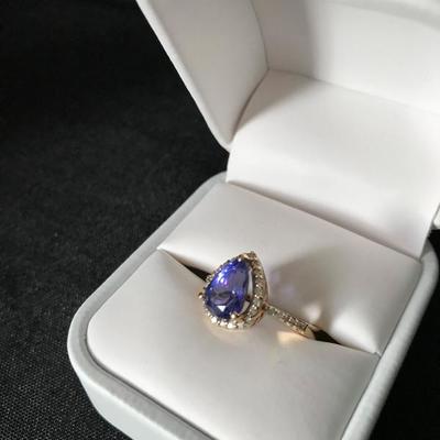 14 k gold with a 2.2 carats TANZANITE and 0.22 carats DIAMONDS by Asher. $1,495