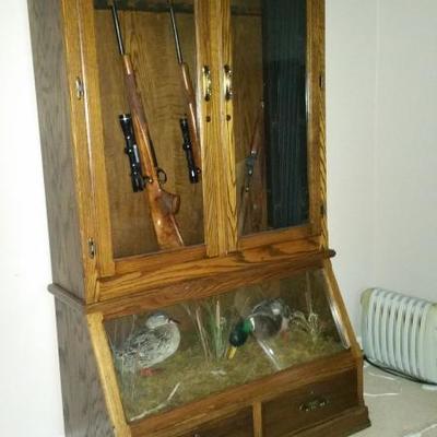 Gun Cabinet Only.  Steel covered with wood.  Very Heavy.  Top removes from bottom for moving.