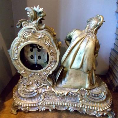 Gilded mantle clock $900
