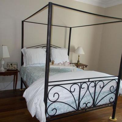 Metal canopy queen sized bed $495
75