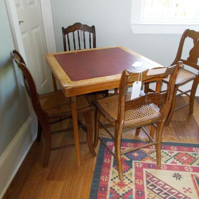 Card table with leather top $45
Antique side chair 