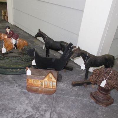 Two black caste iron horse doorstops by Hunter $55 each
Painted rider $75
Bird $45
Bouquet $35
House $25