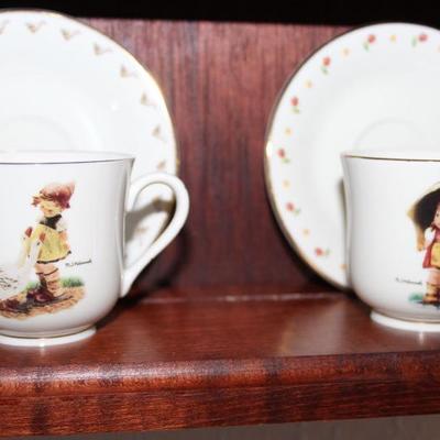 Hummel tea cups with saucers