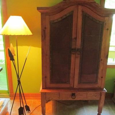 Unusual arrow lamp and Mexican cabinet