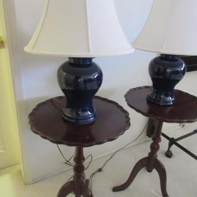 Ornate side tables and lamps