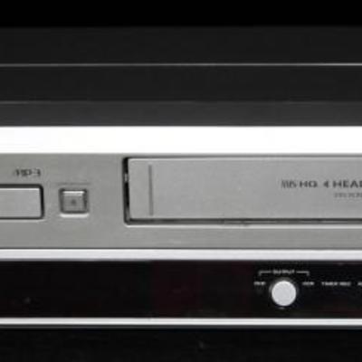 Sylvania Video Cassette Recorder & DVD/CD Player:
4 Head Hi-Fi Stereo on Screen Display VHS Cassette Player