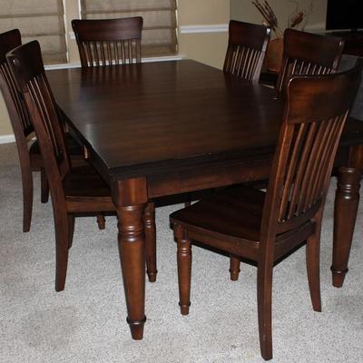 Mahogany Finish Dining Table with 6 Side Chairs (45â€ W x 81â€L) including the 2 - 18â€ Leaves. Will break down to a 45â€ Square Table)