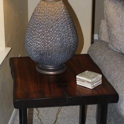 Rustic Slab Wooden Black Steel Base End Table shown with Large Ceramic Textured Gray Lamp w/Gold Base and Accents with Oatmeal Linen Drum...