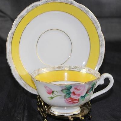Made in Japan Tajimi City (OK in Wreath Hallmark) Hand Painted Demitasse Cup & Saucer shown on a Solid Brass Made in Japan Cup & Saucer...