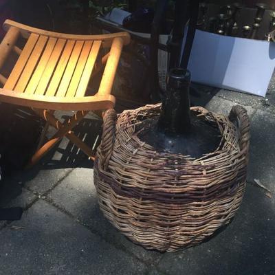 Vintage bottle in basket.