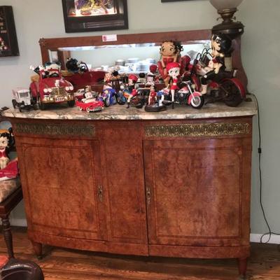 Sideboard with marble top and mirror.  In great condition with a Tigerwood finish.  Available for presale $600